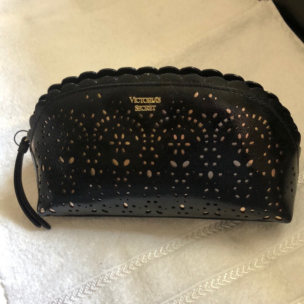 NWT Victoria’s Secret cosmetics bag. Black laser cut.